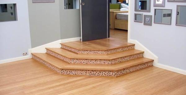 Hardwood flooring integrated with steps.