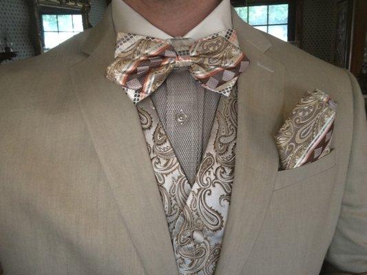 Good luck finding accented gold vests and textured shirts with white collars/cuffs in another store!