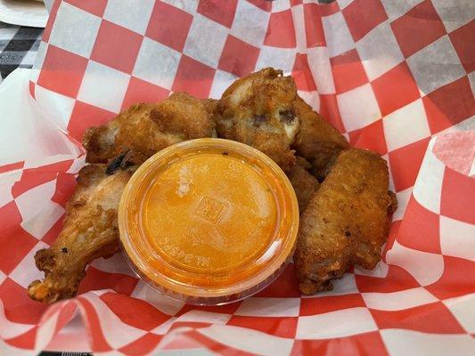 Wings. Meh. Baked but gooey skin.