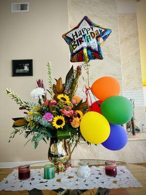 Birthday bouquet with unusual sunflowers and exotic designs. Amazing.