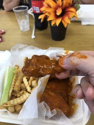 My wing sauce stained happy fingers.