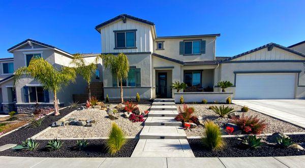 Waterwise landscape with entry steps and accent wall