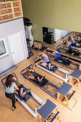 Group Pilates Classes on the reformer.