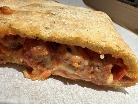 Pepperoni and sausage calzone