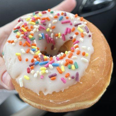 Donut missing a decent portion of icing