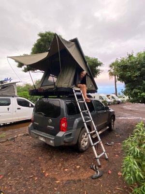 Setting up our rooftop tent from Camp Maui-X.