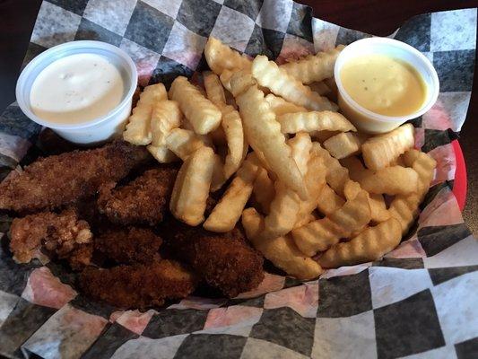 Hard chicken tenders that were difficult to cut with a knife.