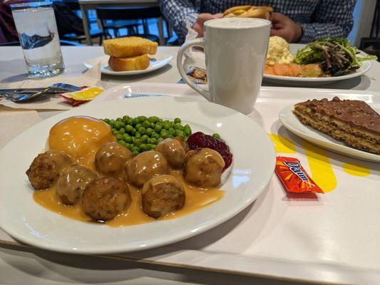 Swedish meatball platter on left. Almond cake on right which comes with piece of Daim chocolate