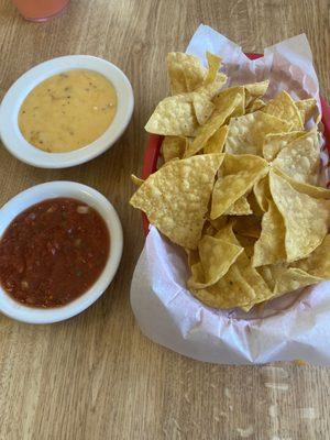 Complimentary chips salsa and queso