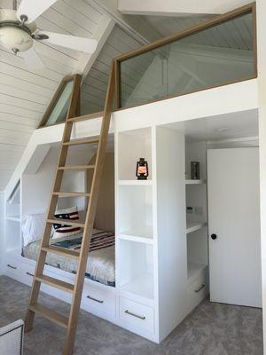 Lake Arrowhead Project, displayed above is a custom bunk bed/loft. We used a combination of painted white maple and stained white oak