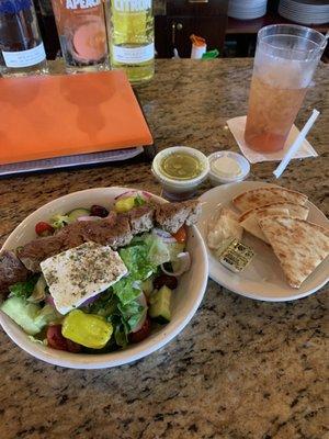 Small Greek salad with slovak (sp?) grilled pork