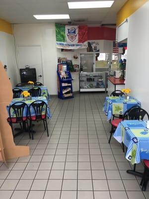 Seating area looking out towards the convenient store