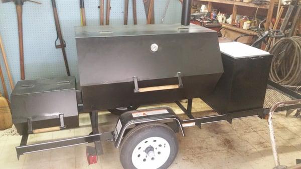 This bad boy smoker fits a whole pig. Sweet.