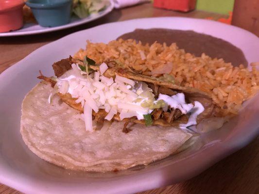 Kids Carlitos plate Chicken taco, quesadilla, rice & beans