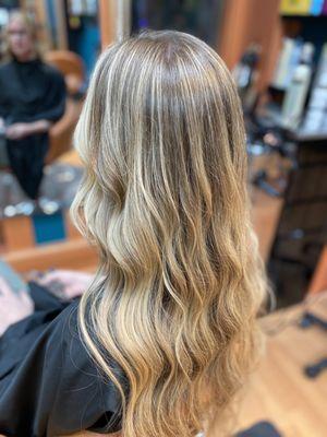 Blonde hair with highlights beautifully placed in