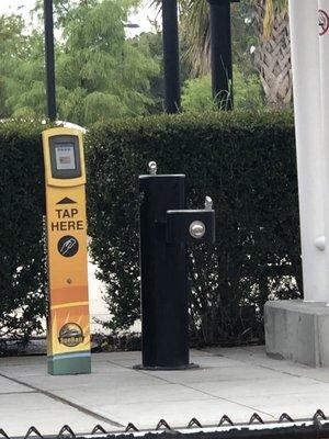 Water fountain on both sides of travel