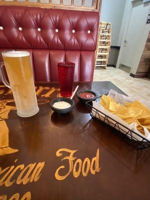 Blue moon in a frosted mug with chips and salsa.