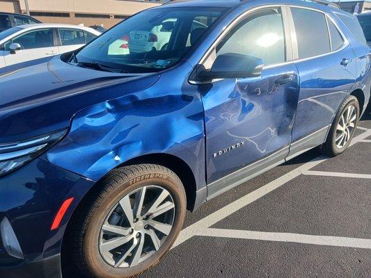 Deer damaged side fender and driver's door.