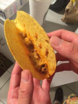 This was sold as a taco, not as a tortilla chip with a smidgen of meat flavored paste.