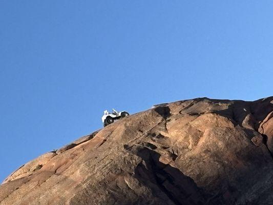 ATV on top of rock