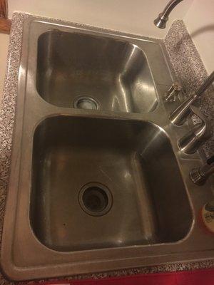 Water coming up from sink