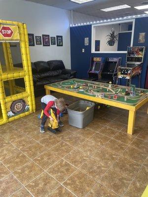 Train table and school bus are among a few of the toys!