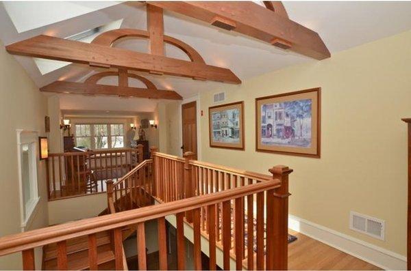 Finished the attic.  Exposed structural beams.  Opened the stairwell to the second floor.