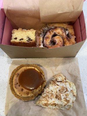 Chocolate chip crumb cake (half was eaten before the photo), cinnamon roll, salted caramel cheesecake, coconut lime scone