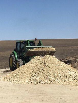 Versatile John Deere tractor used for summer and winter work