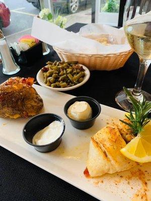 Stuffed flounder and loaded baked potato with green beans