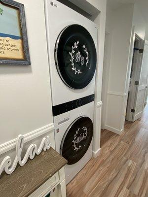 Washer/dryer in the hallway.