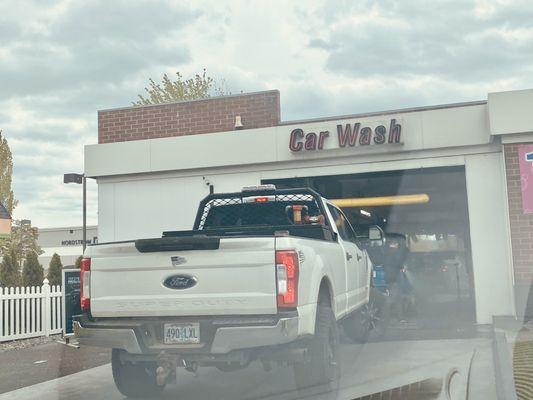 Super Duty Ford Pickup  going through the car wash