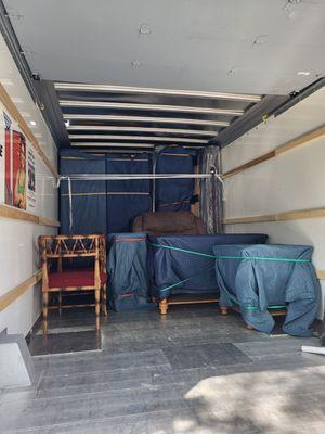 Furniture wrapped and loaded into a truck