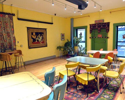 The back of the Samba Loft space has another room with cafe style seating, ceiling mounted projector and large screen.