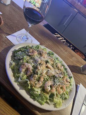 Caesar salad with garlic prawns