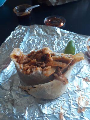 Bomb burrito de Pastor/Adobada. So good.