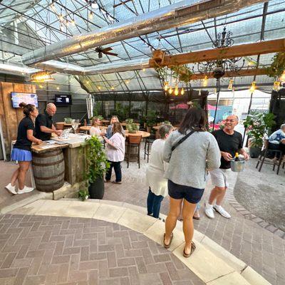 Located in a converted greenhouse and adjacent courtyard, our unique setting a great place to gather with friends