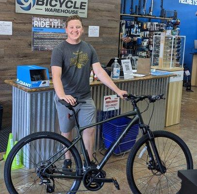 Zach is out riding his new Giant Roam Hybrid bike! Congrats