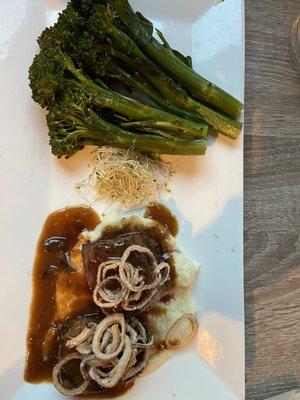 Elk steak with mashed potatoes and broccolini