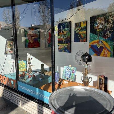 Another great window display at Riverfront Art Gallery.