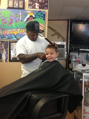 Big man getting a haircut with Nestor