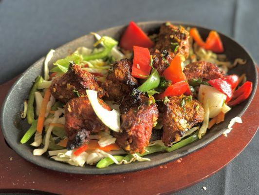 Lamb Tikka (Tandoor grilled): rich in flavor.