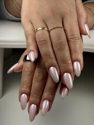 Hard gel manicure with chrome powder.