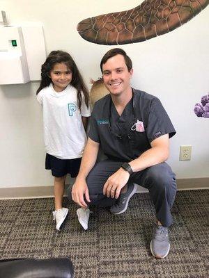 Lovely Audrey posing with her dentist