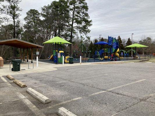 Parking by the Sonora x Tower intersection by the picnic shelter and playground