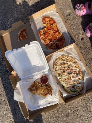 Parking lot pizza during Music on Third.