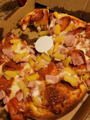 Maui wowie hawai hawai hawai hawai Hawaiian pizza with added pepperoni.