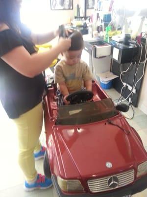 Haircut for my 2 year old. He loved the car chair.