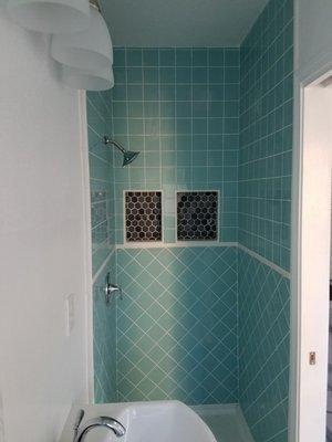 Worked with my great tile guy to create a stunning 3' by 3' shower. Looks way bigger tha it is