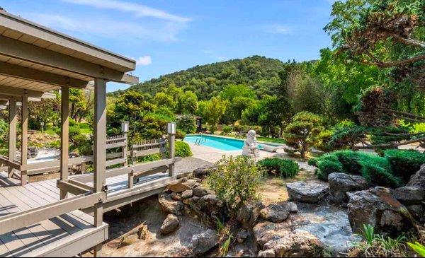 Unique gated estate & one of the finest properties in Palomares Canyon offers a private setting, nestled among the trees, on 35 arcers